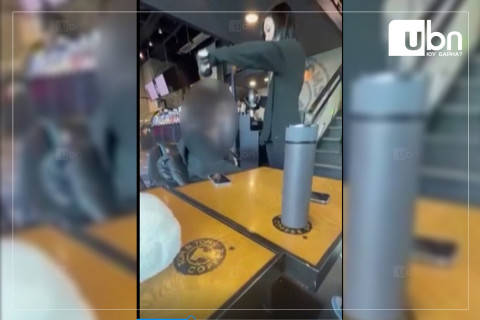 ВИДЕО: Цагдаад зодуулсан гэх охин бусдын дээр халуун кофе асгасан хэргээр цагдаад байцаалт өгөхөөр очжээ